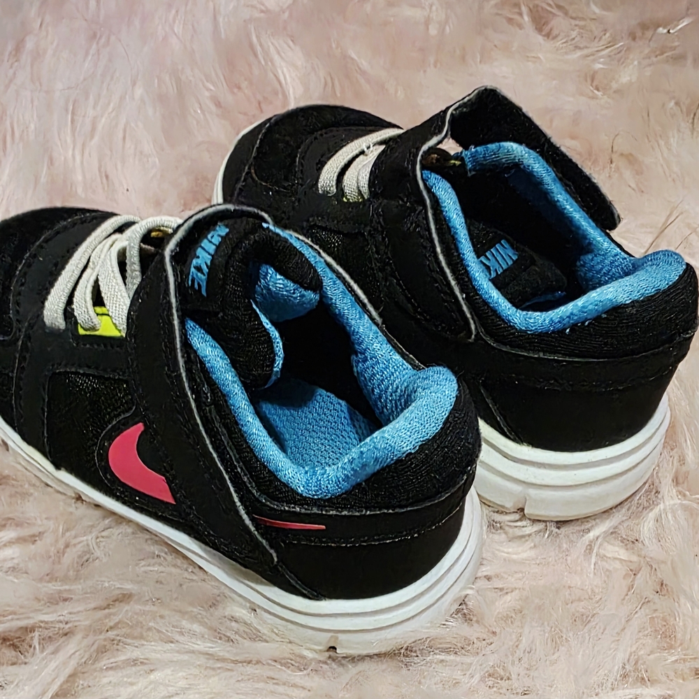Nike Black and Pink Sneakers with Low-Top Design